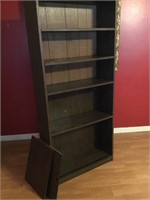 Bookcase.  Two sliding doors there but off