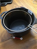 Cast iron pot with fry basket