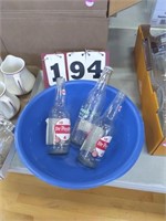 Plastic Bowl and 3 Old Glass Pop Bottles
