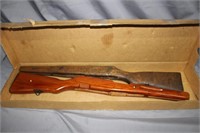 Two wood rifle stocks