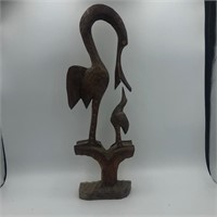CARVED WOODEN CRANE FEEDING YOUNG 22”