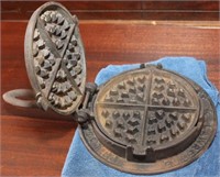 Cast iron stove top waffle iron by  Abbott &
