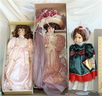 6 dolls in boxes