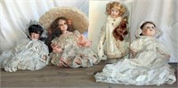 Doll in Christening gown and 3 other dolls