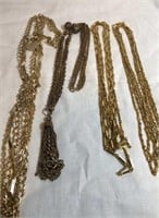 Costume gold tone necklaces, very long and draped