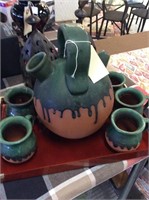 Pottery pitcher and mugs decor