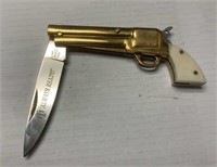 Small brass pistol knife