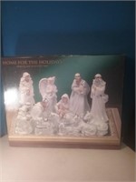 New home for the holidays porcelain nativity set