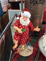 Santa on beach with crab figurine