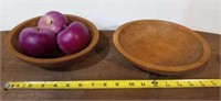 2 wooden bowls and apples