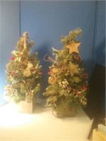 Pair of lit holiday trees in planters 24 in