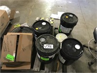 Skid w/ buckets of Adtech glue & weather