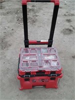 Milwaukee rolling tool box with assorted parts