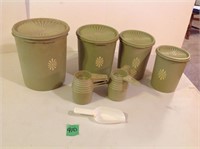 green tupperware canister set, lg one cracked,