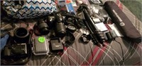 LARGE ASSORTMENT OF NIKKON CAMERAS AND ACCESSORIES
