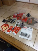 Lot of military patches and pins.