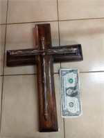Wood cross with nails. Decor.