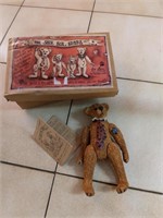 Shoe box collectible bear.