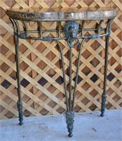 Bronze patinated iron and faux marble console witr