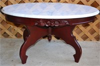 Mahogany finish marble top oval coffee table