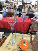 Three piece blue glass candleholders