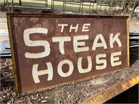 The Steak House metal sign