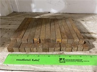 Square bar stock. The 27 pieces are 1/2 x 6 in.