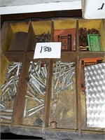 container of screws