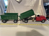 Customized truck w dump trailer & other pull
