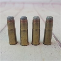 Four rounds of  Peters .38-40 Ammunition