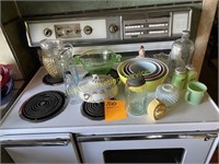 Pyrex and Other Vintage Glass on Top of Stove