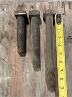 Approximately (25) 1" square head bolts