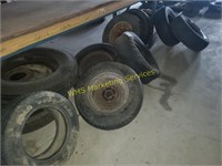 Assorted Used Tires Under Racking