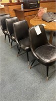4 black vinyl dining chairs