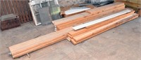 Pile of structural lumber: 2 x 6 and 2 x 10,