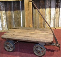 Antique wood and steel industrial pull cart, rubbe