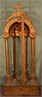 Carved and gilt decorated wood and ornate metal sh