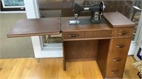 White Sewing Machine and Cabinet