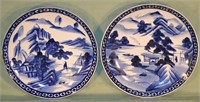 2 Asian blue decorated porcelain chargers, wax sea