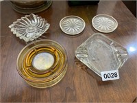 Lot of ashtrays and glass coasters