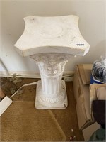 White plaster column plant stand