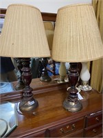2 wood and brass lamps