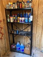 shelf with auto misc items gear oil etc.