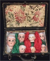Black Trunk w/7 Antique Doll Heads -