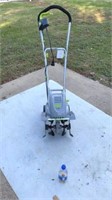 Brand new out of box, electric Earthwise,