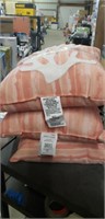 3 coral shade pillows