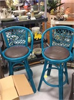 Set of two dark teal colored outdoor barstools