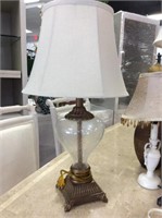 Glass base lamp with linen shade