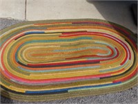 2 Braided Rugs largest is 58"L shows wear