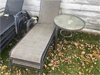 2 chase lounge chairs and  27 in. glass top table